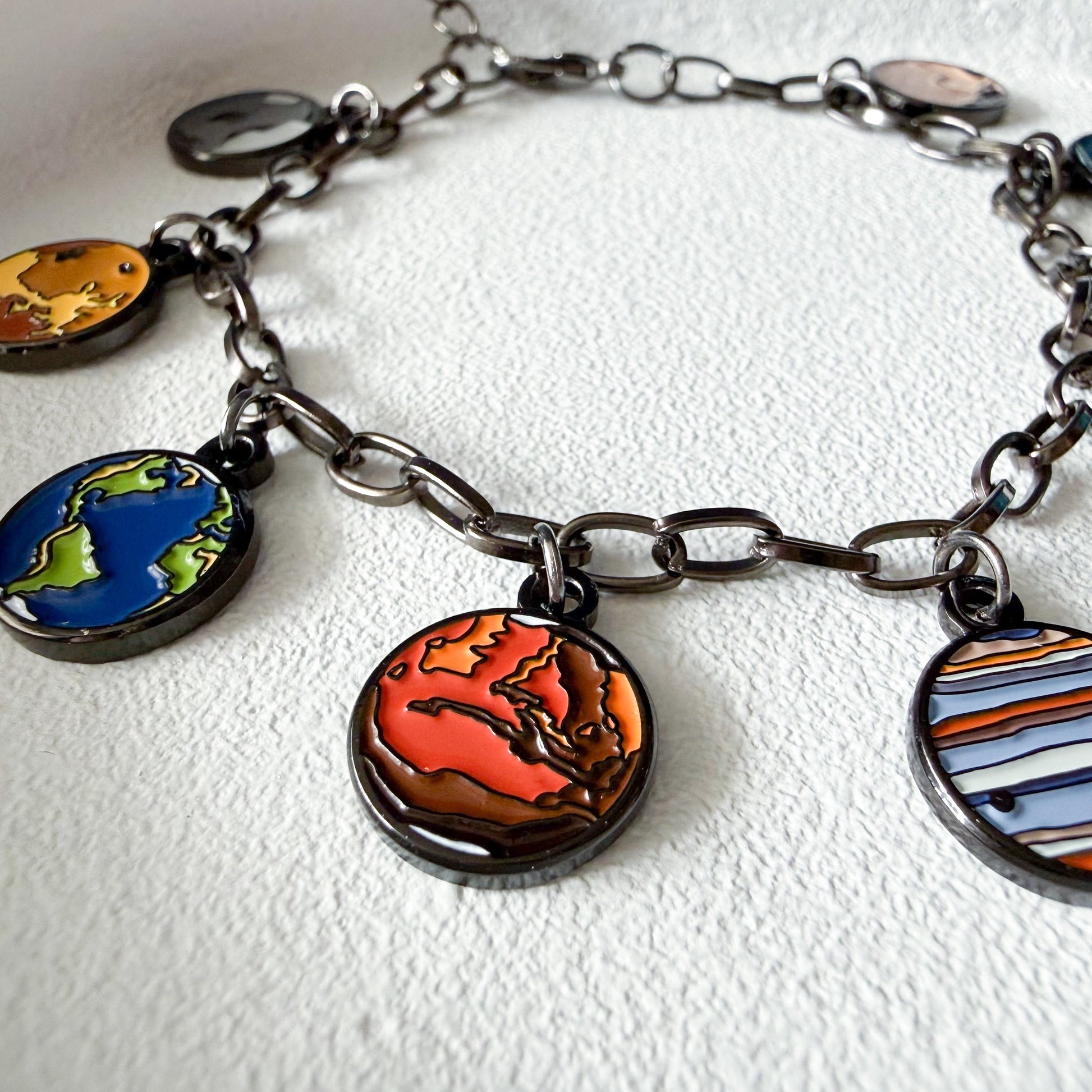 Bracelet with colorful charms on a white background