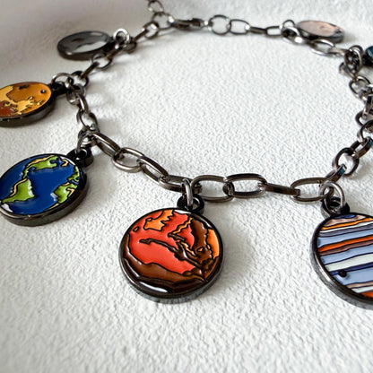 Bracelet with colorful charms on a white background