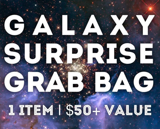 Promotional graphic with large white text reading 'GALAXY SURPRISE GRAB BAG' and '1 ITEM | $50+ VALUE' over a starry galaxy space background.
