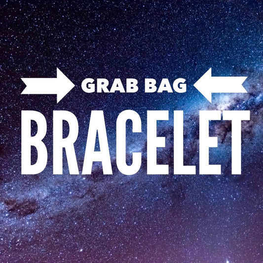 A square graphic with a starry space background and large white text reading 'GRAB BAG BRACELET' with arrow shapes pointing inward.