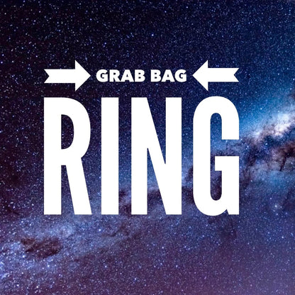 A graphic with a starry space background and large white text reading 'GRAB BAG RING' with arrows pointing inward.