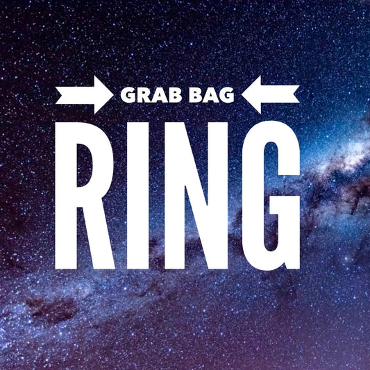 A graphic with a starry space background and large white text reading 'GRAB BAG RING' with arrows pointing inward.